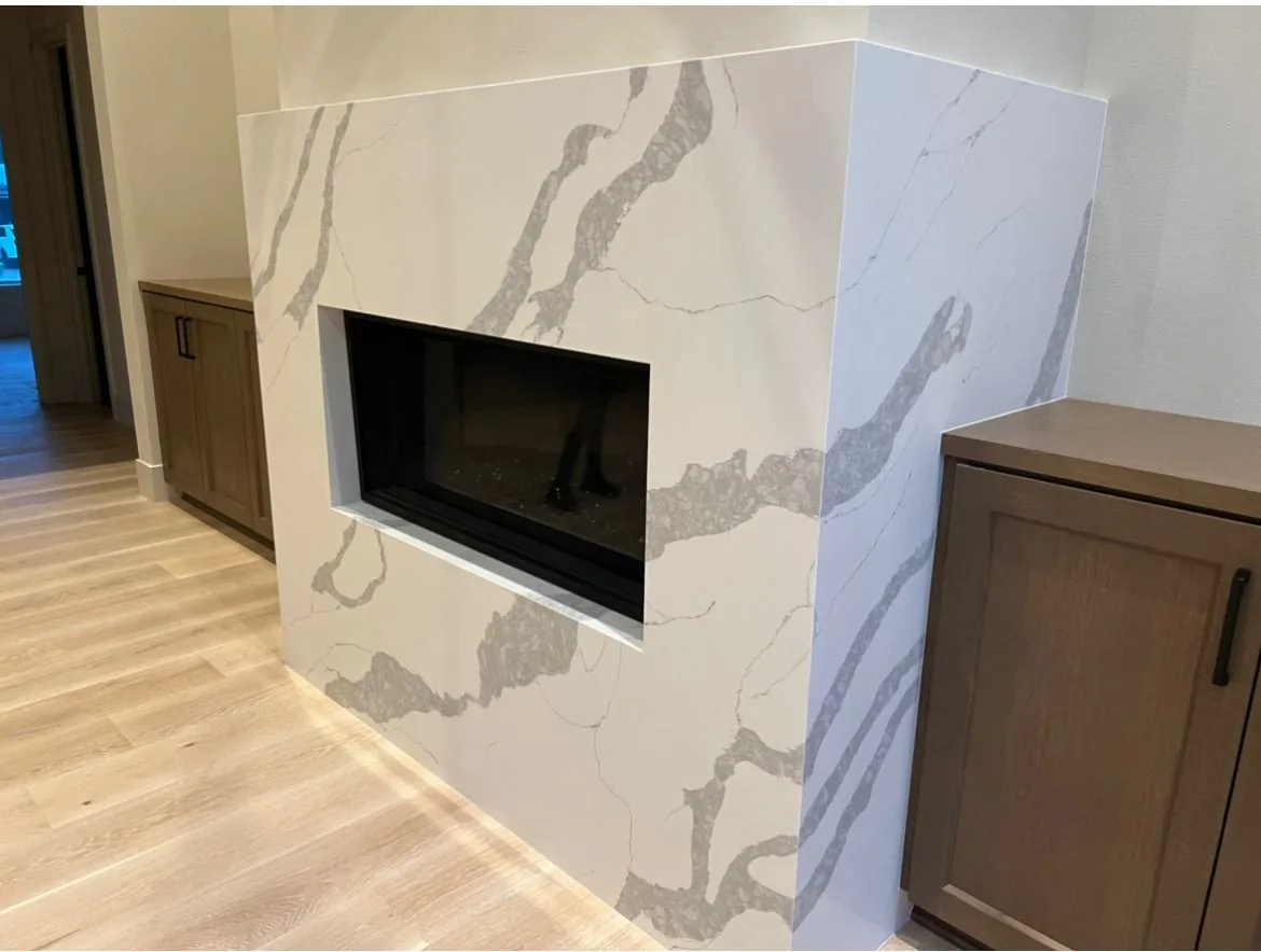 White veined fireplace surround